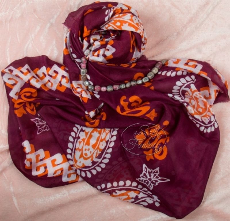 Kelagayi "Luxurious vinous color with orange and white galib patterns"