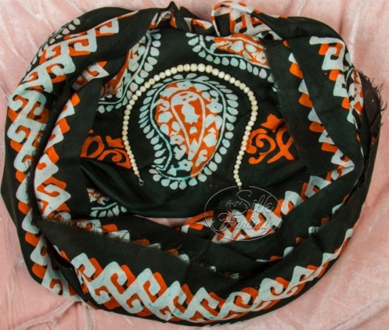 Kelagayi "Orange and white galib patterns on black background"