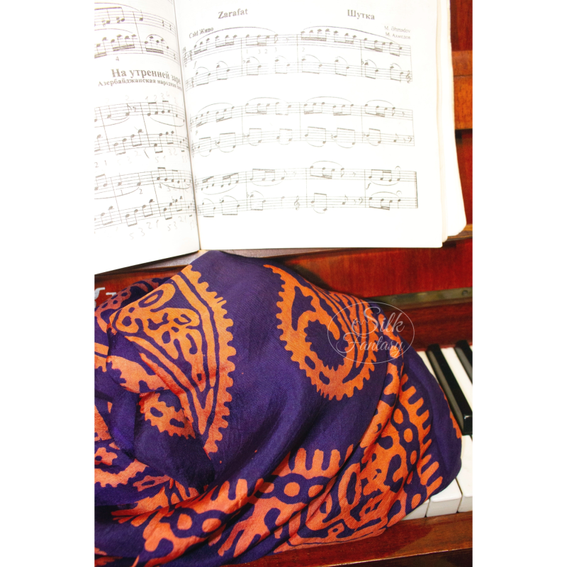 Kelagayi "Dark blue-violet background and orange-golden galib patterns"