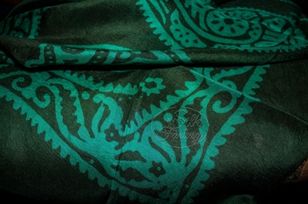 Kelagayi "Dark gray with a greenish tint background and turquoise galib patterns"