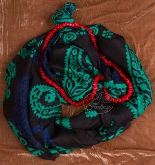 Kelagayi "Very dark green, almost black background and galibs of blue and ancient turquoise colors"